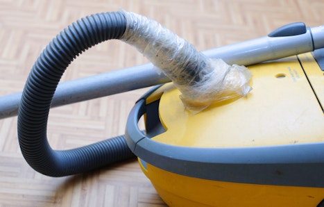 Broken and repaired vacuum cleaner.