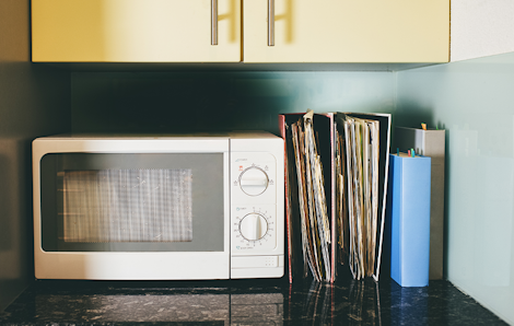 Microwave on the kitchen counter.