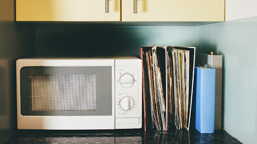 Microwave on the kitchen counter.