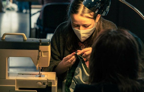 Image of person sewing