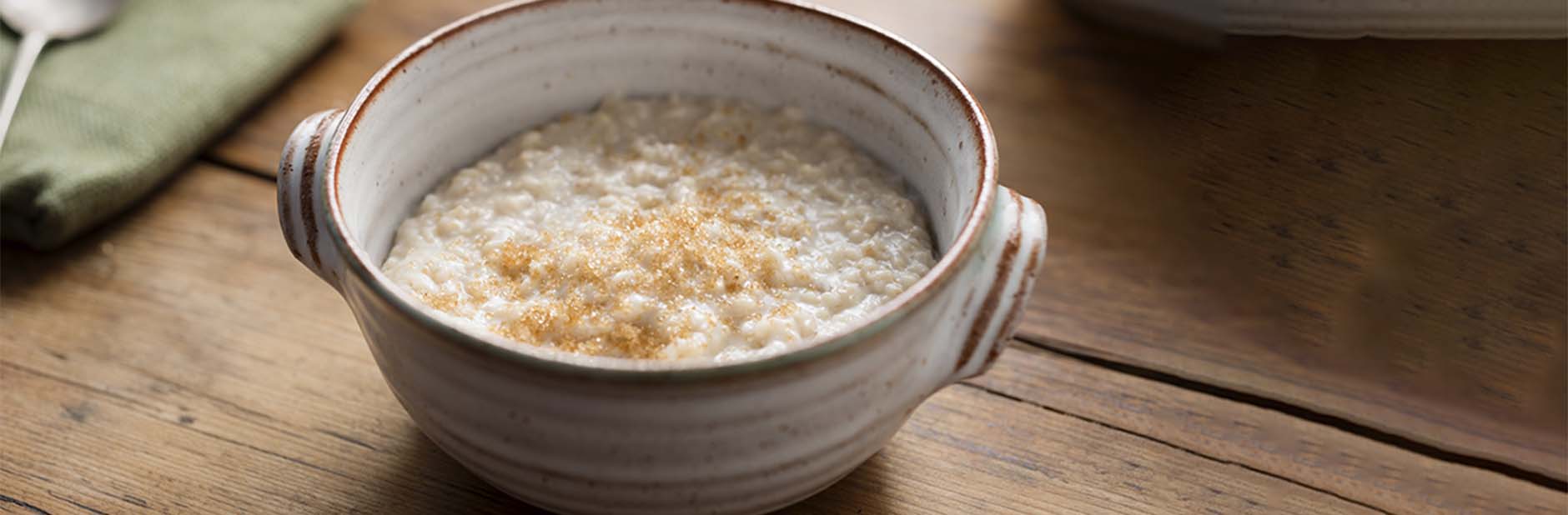 bowl of porridge with brown sugar on top