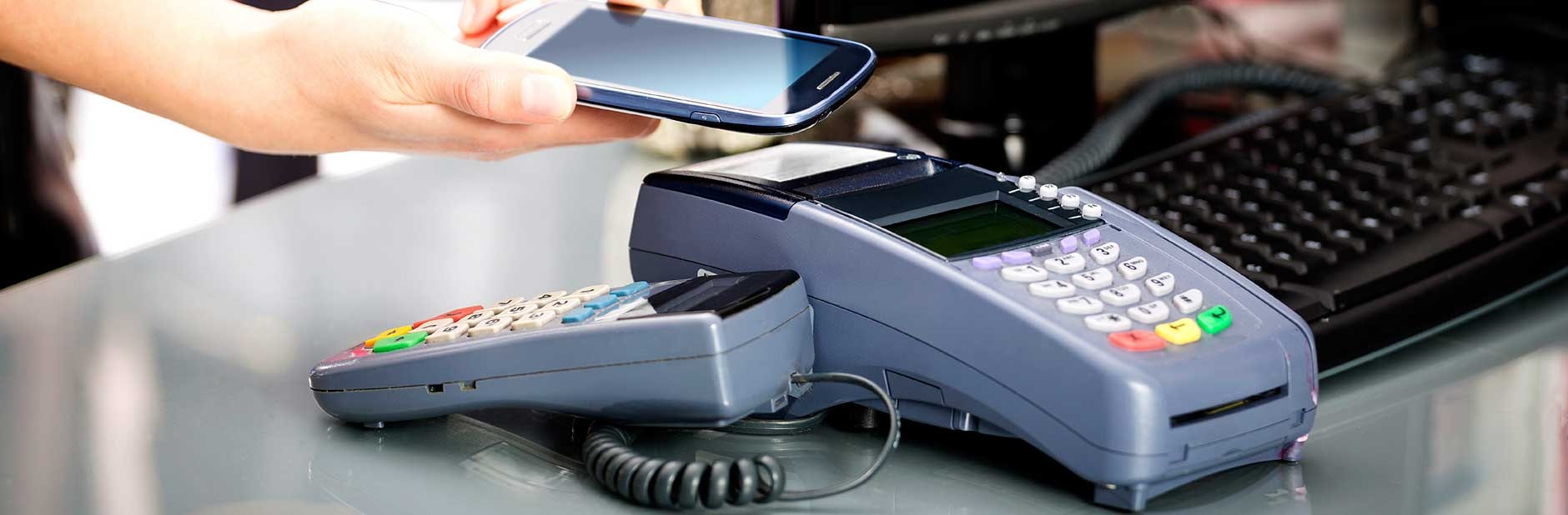 Making a payment at EFTPOS terminal.