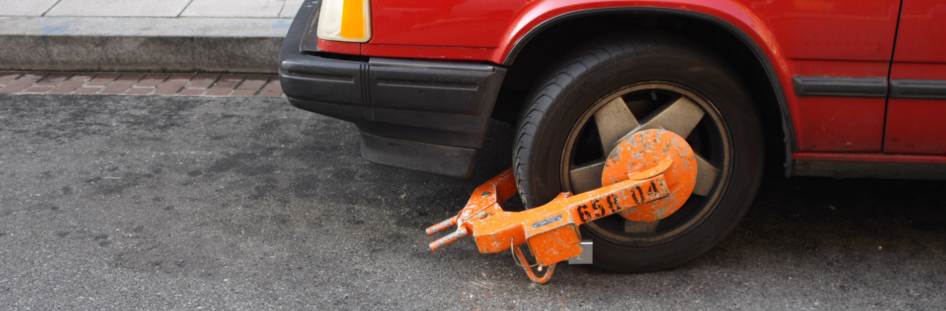 Car with clamped wheel