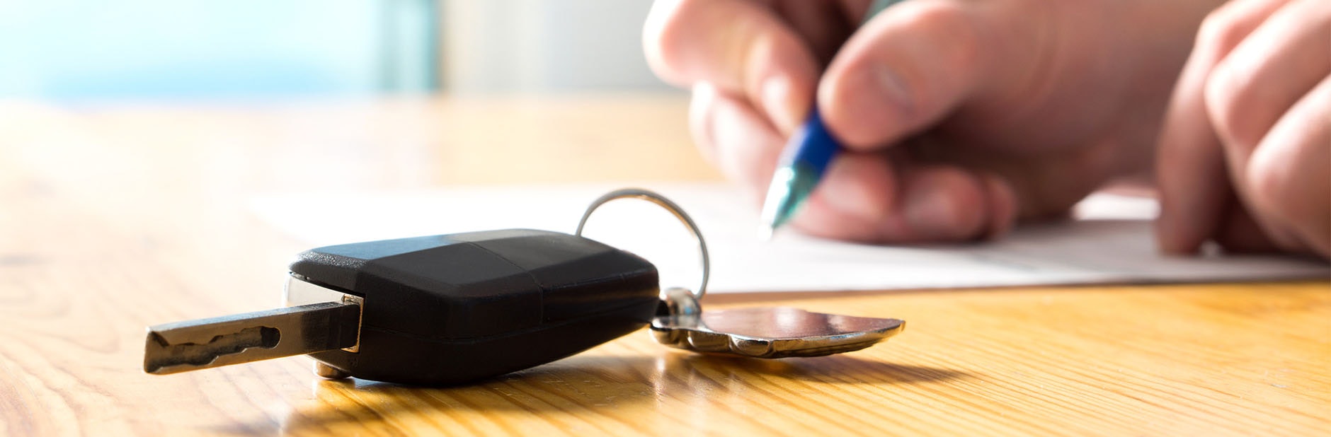 Filling out car paperwork.