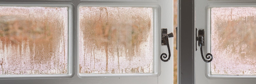 window with condensation cracked open