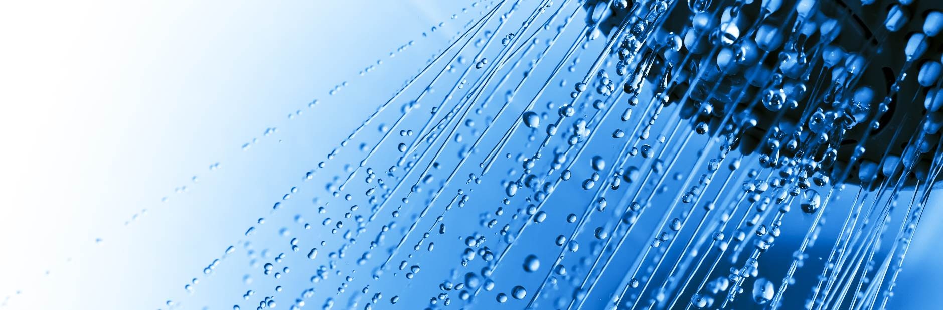 Shower heading blasting hot water.