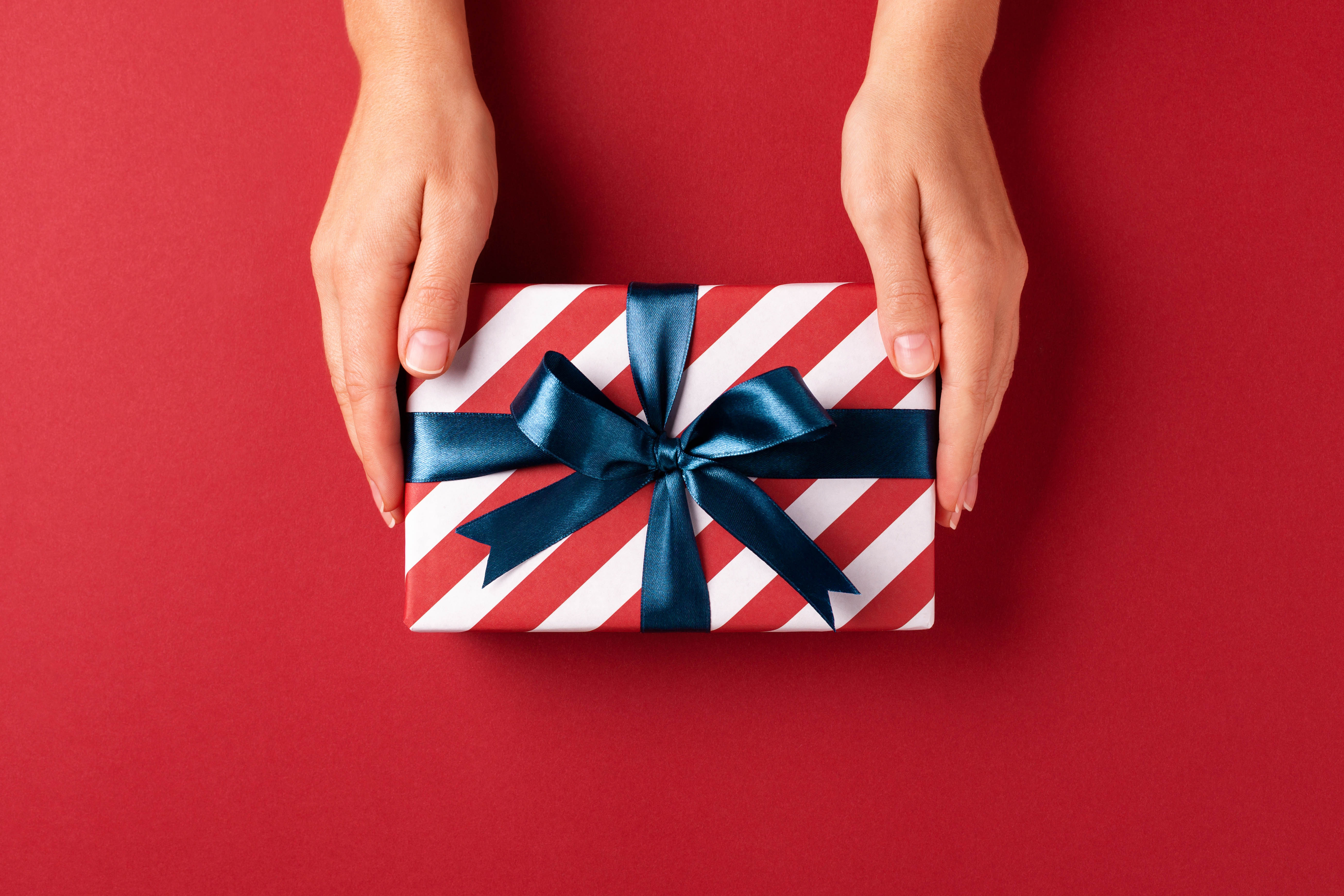 Hands holding a gift