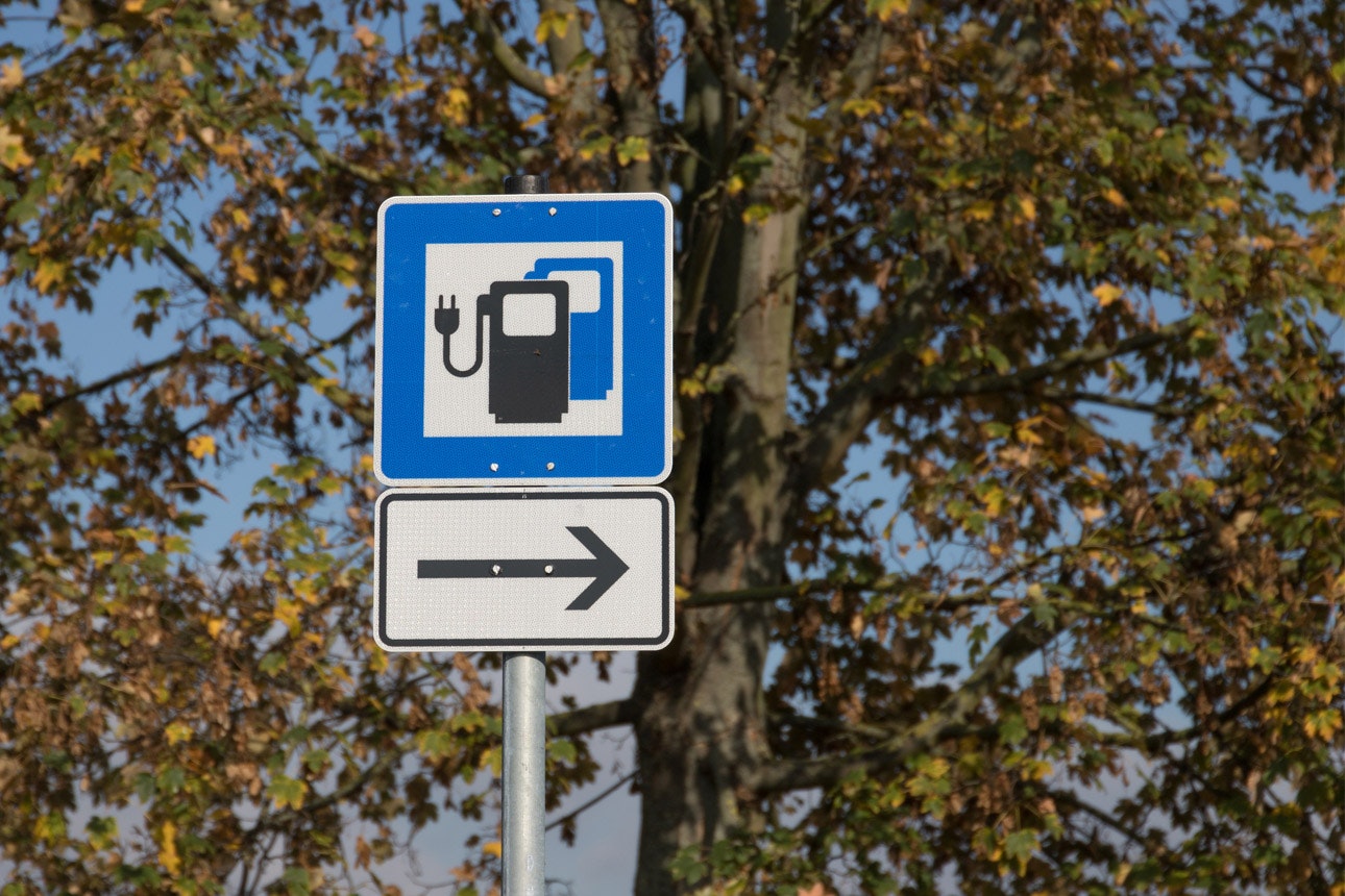 Electric vehicle charging station sign.