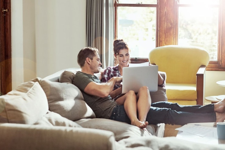 a couple review their options for an insurance provider