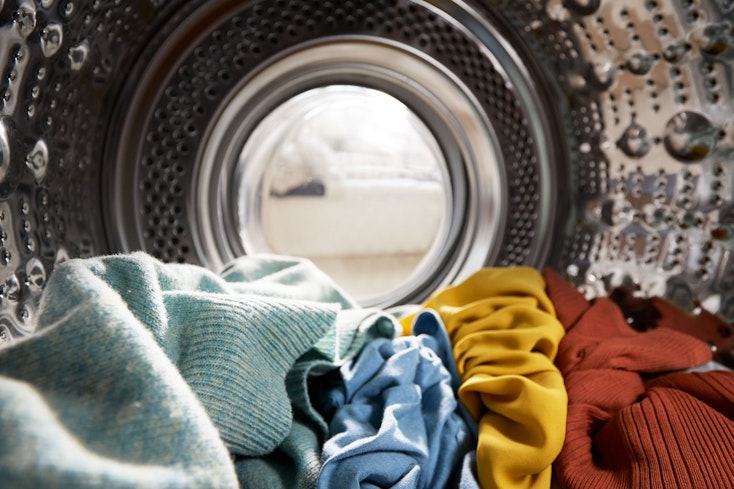 Clothes inside a washing machine.