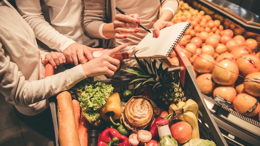 Image of three women grocery shopping