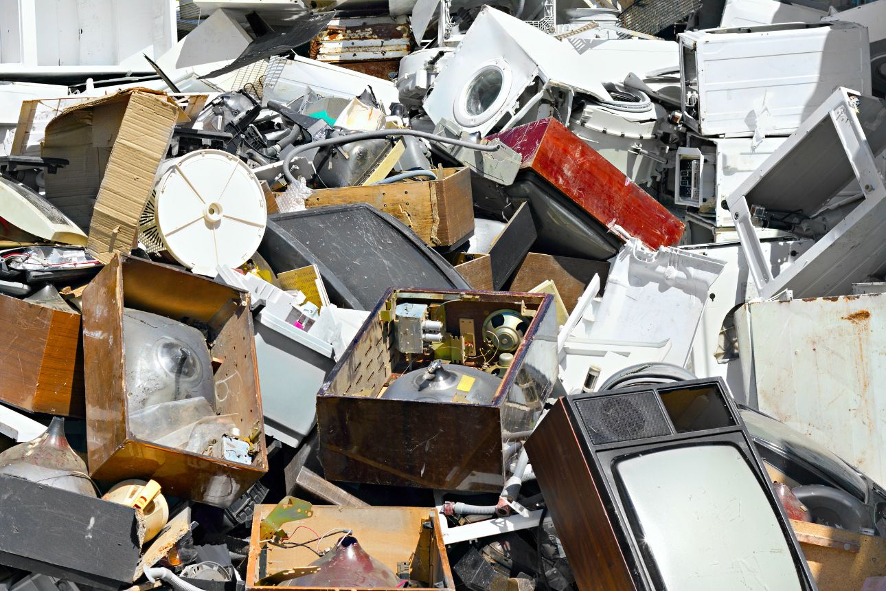 Image of broken appliances in landfill