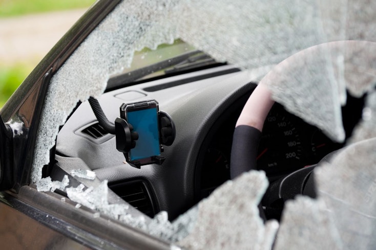 Image of a smashed car window