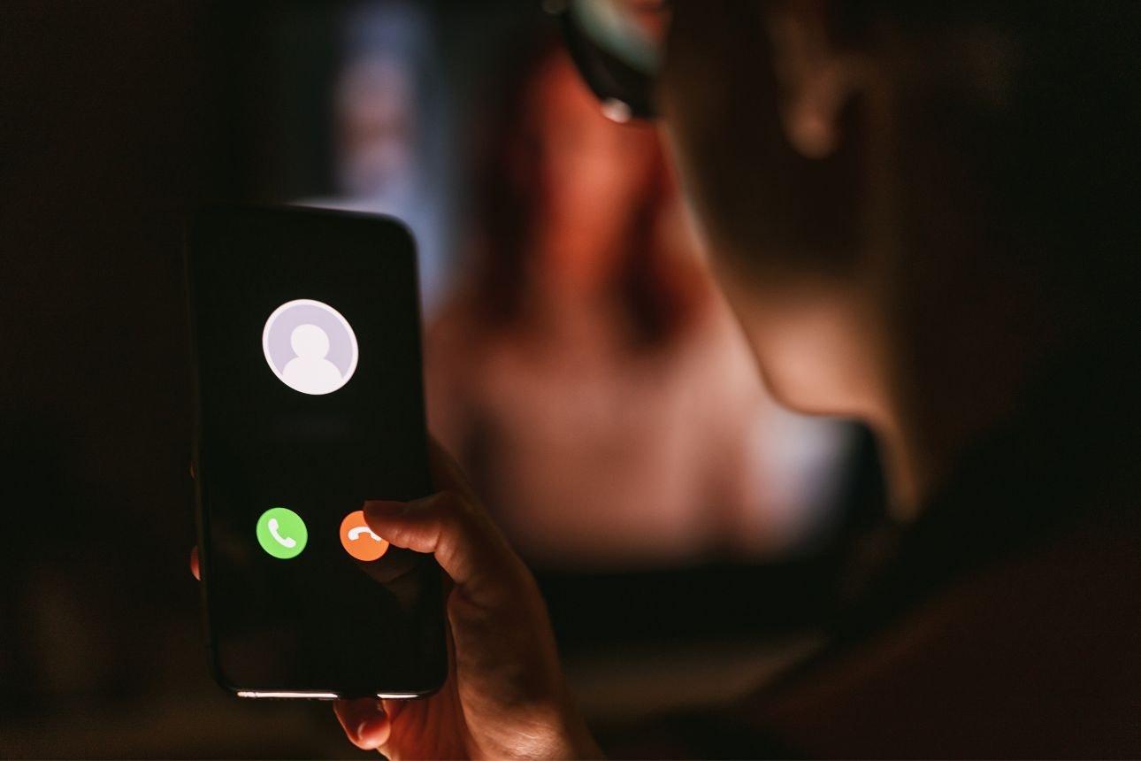 Image of a woman getting an unknown phone call