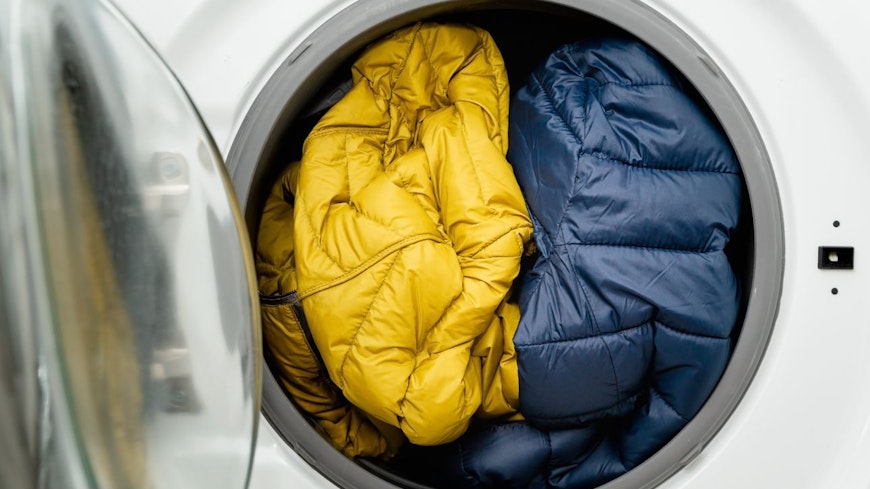 Image of puffer jackets in the washing machine