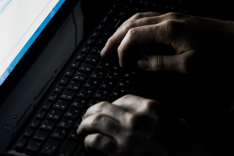 Image of hands typing on a keyboard