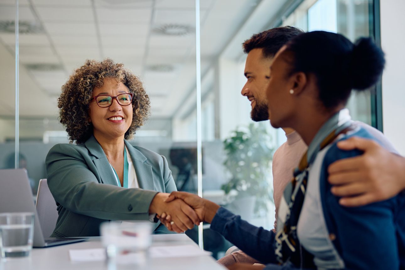 Image of a couple with a financial advisor