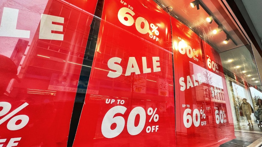 Sale signs on storefront