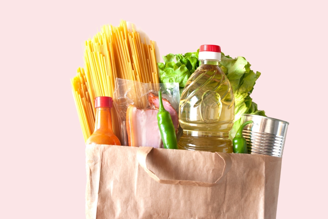 Grocery bag on pink background.