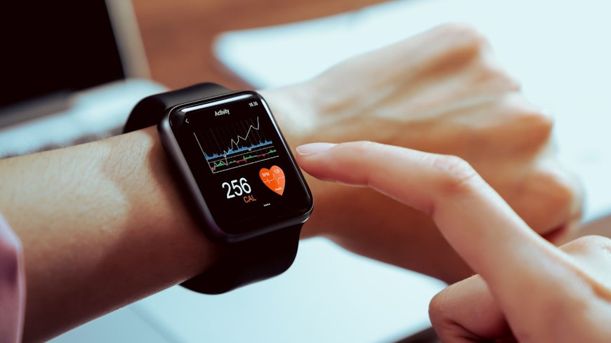 Image of a woman wearing a fitness tracker