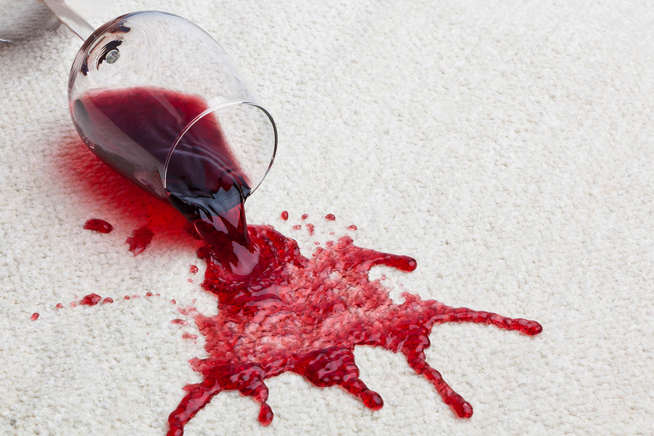 Image of spilt wine on carpet
