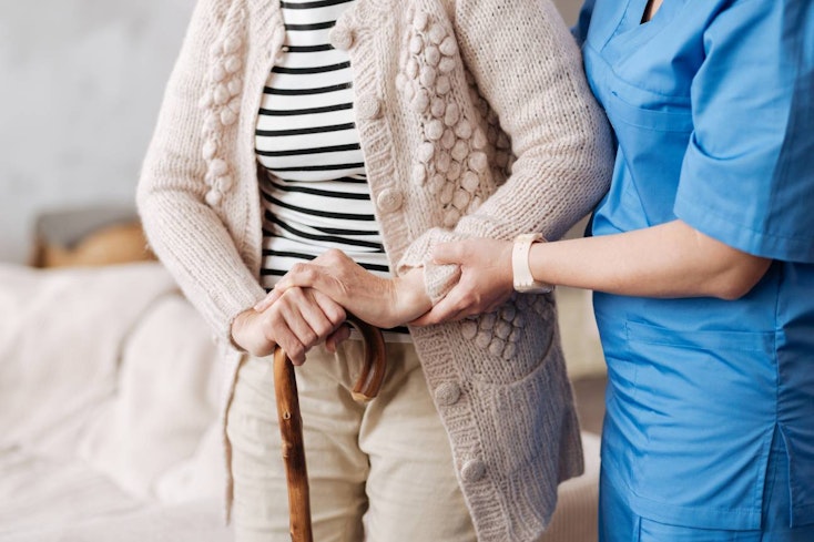 Image of an elderly woman and nurse