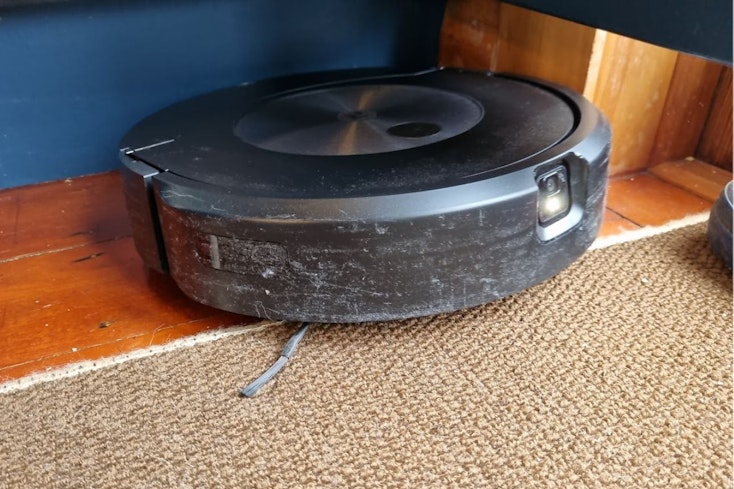 Image of a scratched robot vacuum cleaner