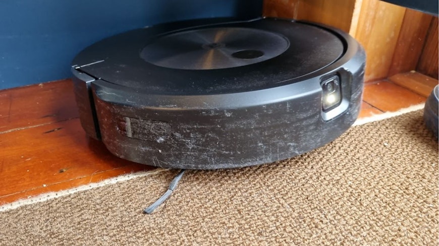 Image of a scratched robot vacuum cleaner