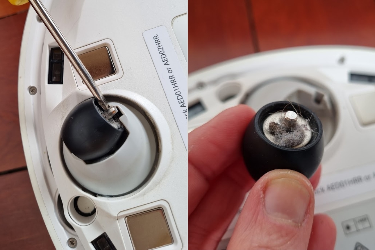 Image of dust stuck under a vacuum wheel