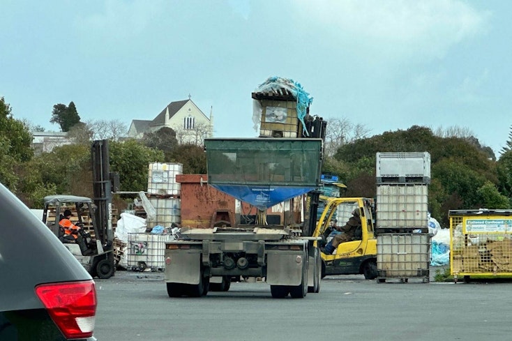 Image of a rubbish truck at the dump