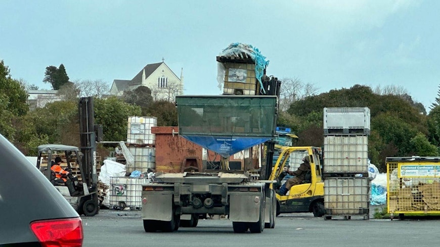 Image of a rubbish truck at the dump