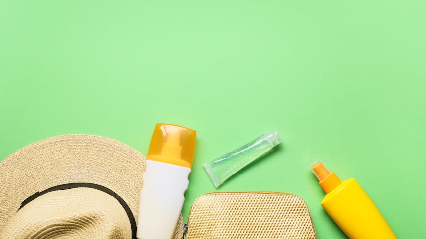 Sunscreen on a green background