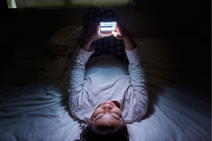 Teenager on her phone