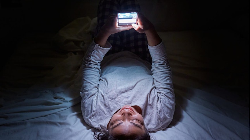 Teenager on her phone