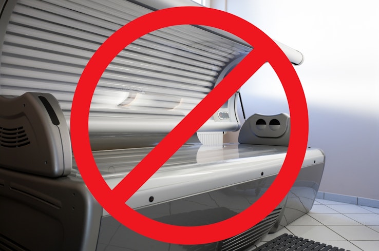 Sunbed with a prohibited symbol on it.