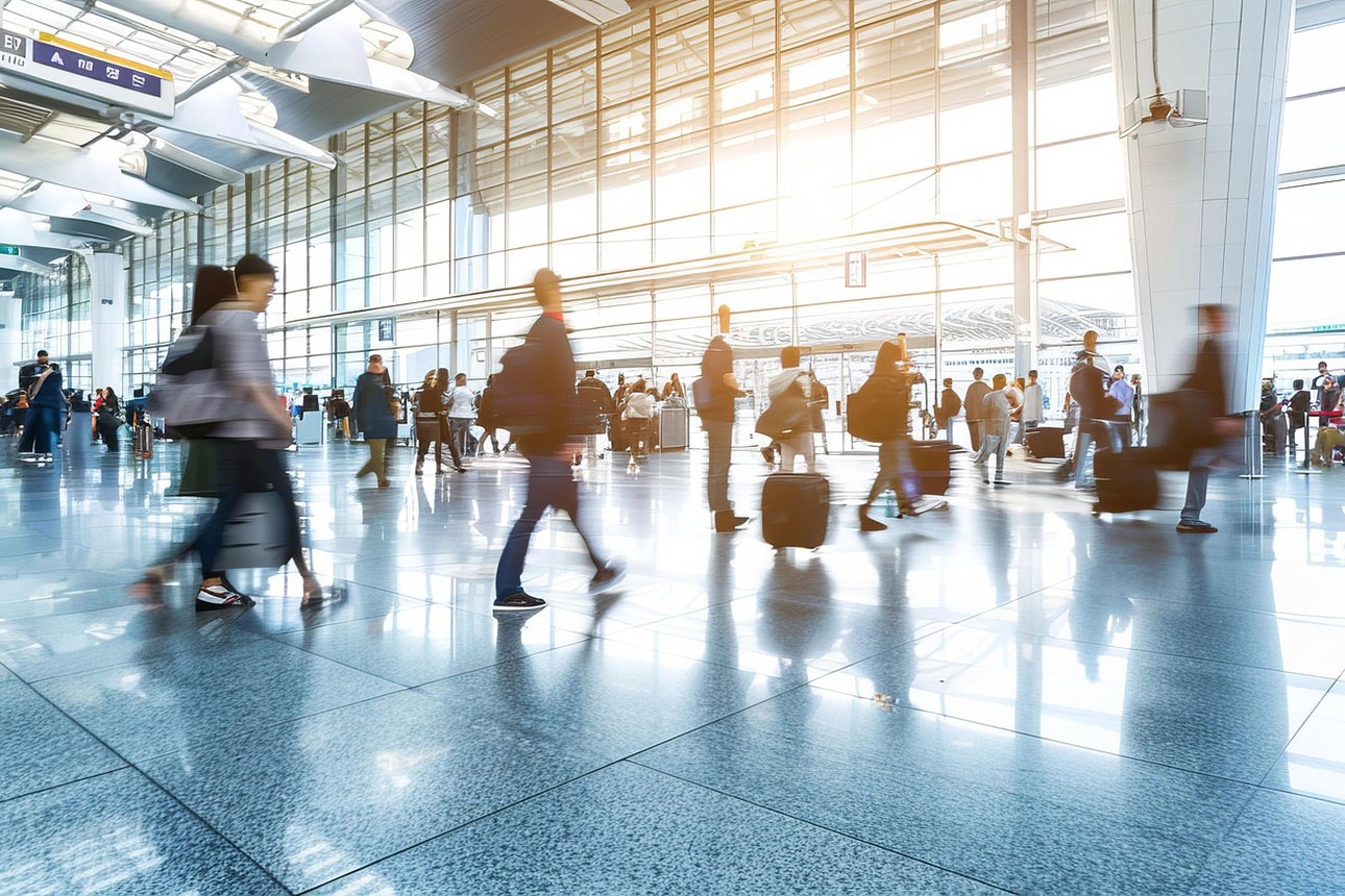 People walking through airport.