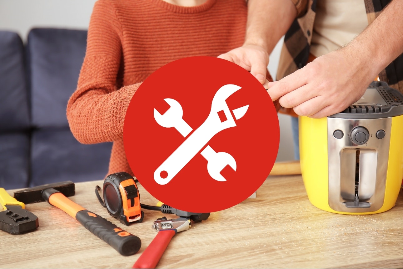 Man fixing appliance.