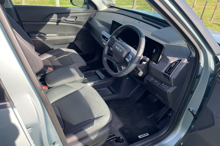 Kia EV5 Light+ cloth and composite leather interior.