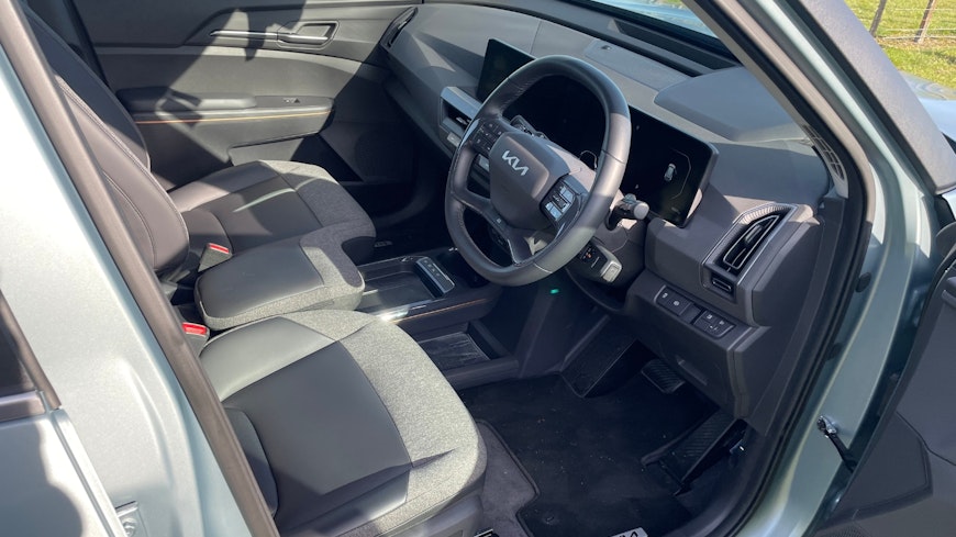 Kia EV5 Light+ cloth and composite leather interior.