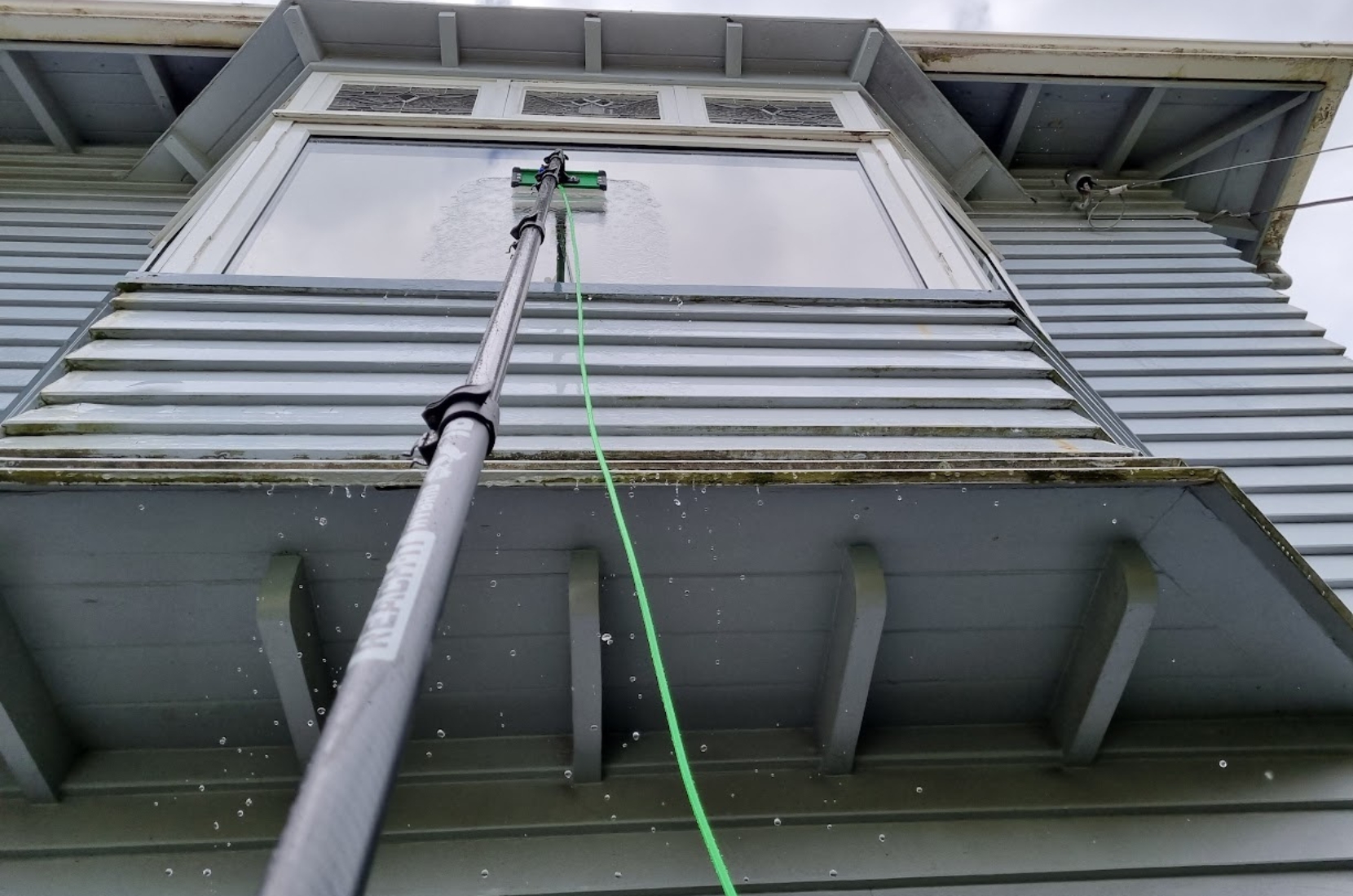 Cleaning window.