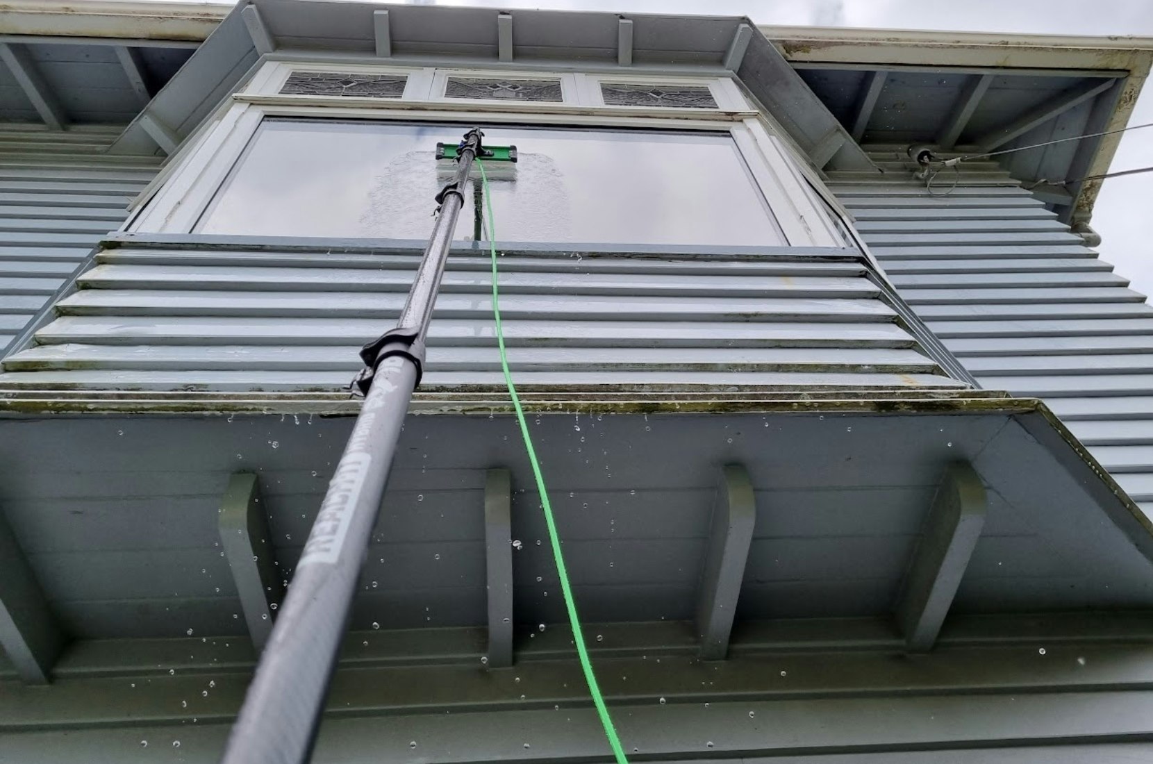 Cleaning window.